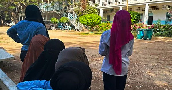 The laity corrects the PM over wearing off the veil in schools